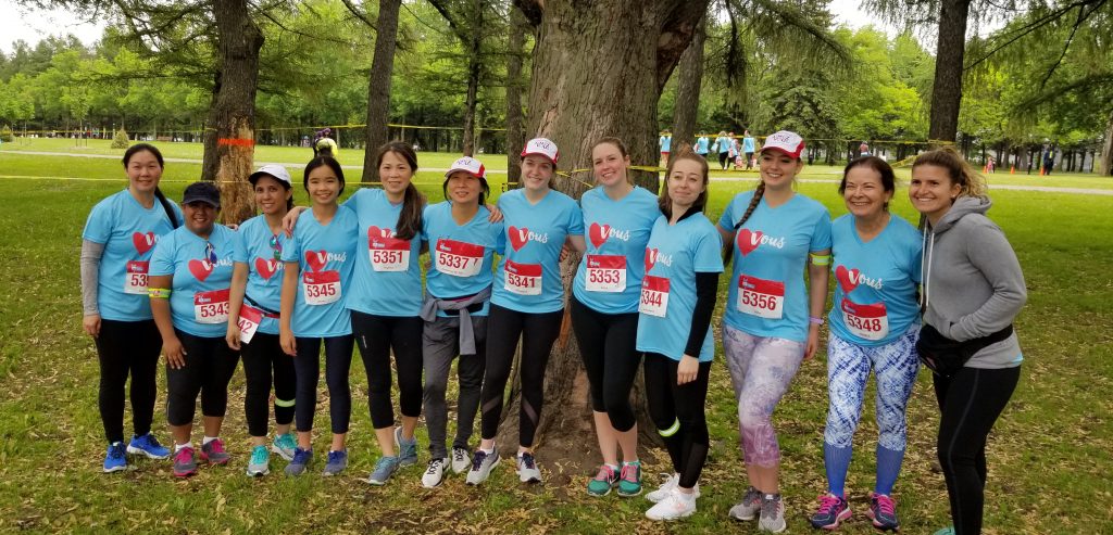 Run for Women team of MUHC nurses standing in front of tree