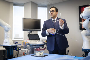 SuPER Founding Director Amir Hooshiar, PhD, performs a demo.